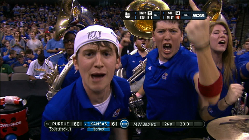 Illustration for article titled Sweetness Follows: Crazy-Faced Kansas Fan And The Other Mugs Of March Madness, Day Four